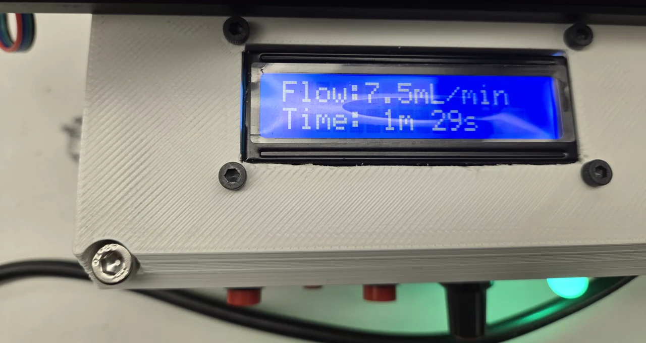 The pump display reading "Flow: 7.5 mL per minute" on the first line and "Time: 1m 29s" on the second.